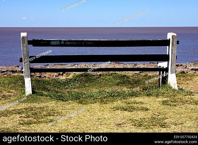 water coastline bench and summer in near the beach rio de la plata colonia del sacramento uruguay