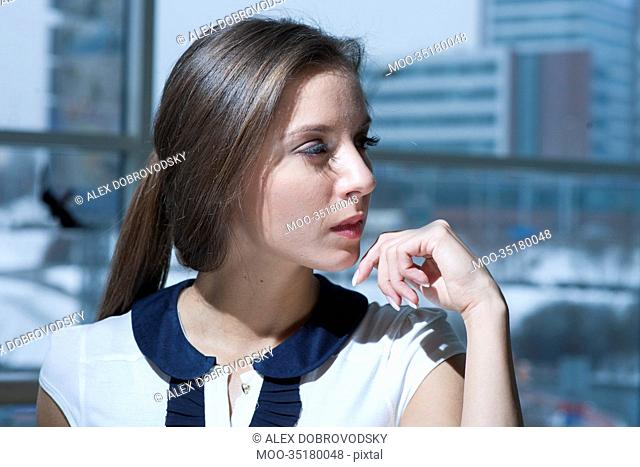 Close-up of businesswoman looking off camera