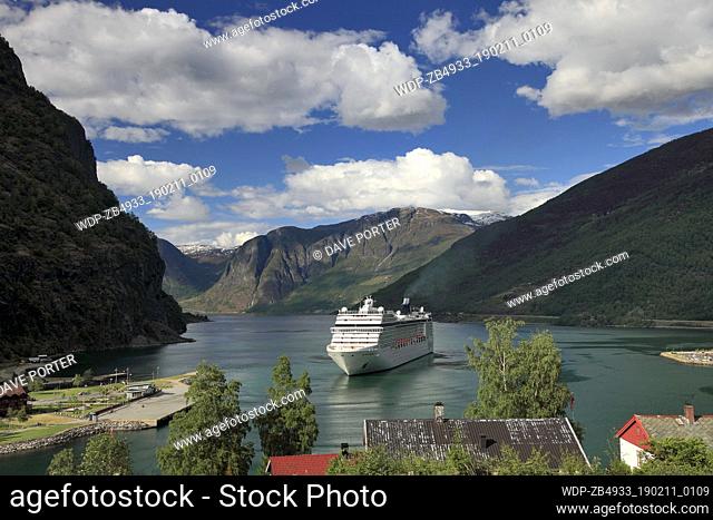 View of the Cruise ship MSC Orchestra, in the harbour at the town of Flam, where the famous Flam Railway starts from, Aurlandsfjorden Fjord