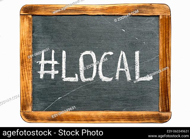 local hashtag handwritten on vintage school slate board