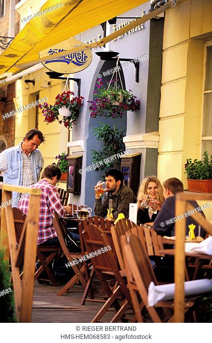Lithuania (Baltic States), Vilnius, a restaurant outside café in Pilies street in the old town
