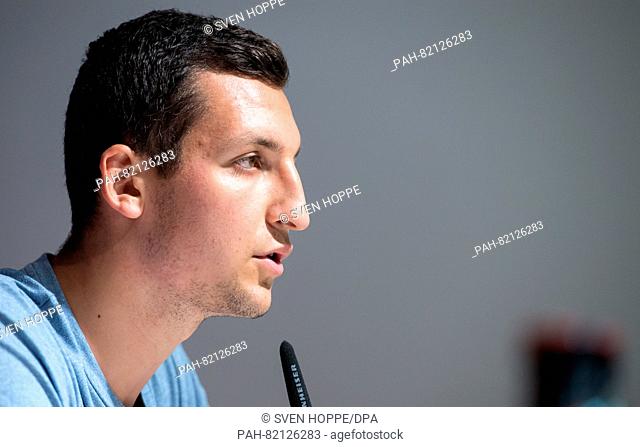 National basketball player Paul Zipser from FC Bayern Munich speaks at a press conference in Munich,  Germany, 18 July 2016