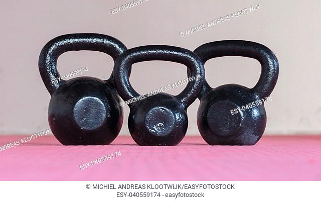 Black kettlebell ina gym - Selective focus