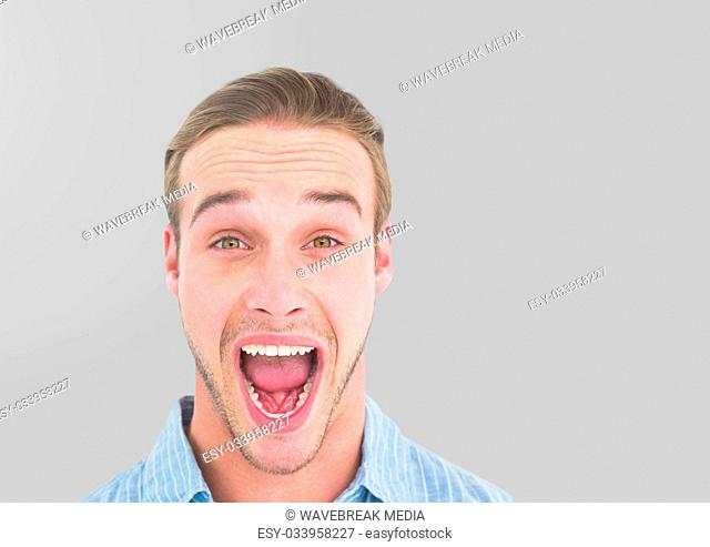 Portrait of cheering Man with grey background