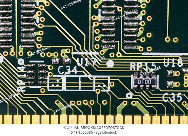close up photograph of computer RAM memory chips, solder side