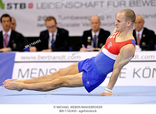 Filip Ude, CRO, performing floor exercises, EnBW Gymnastics World Cup 2010, 28th DTB-Cup, Stuttgart, Baden-Wuerttemberg, Germany, Europe