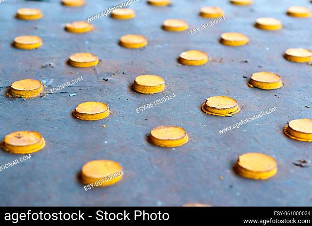 background yellow pimples, round metal yellow projections
