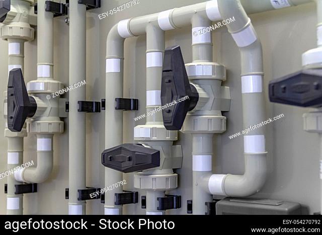 detail of a pipeline system with lots of tubes and fittings