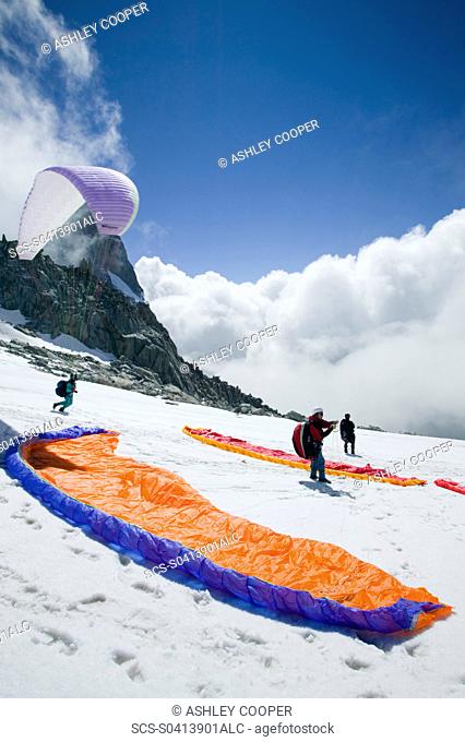 Paraponters preparing to take off from the Grand Montets above Chamonix France