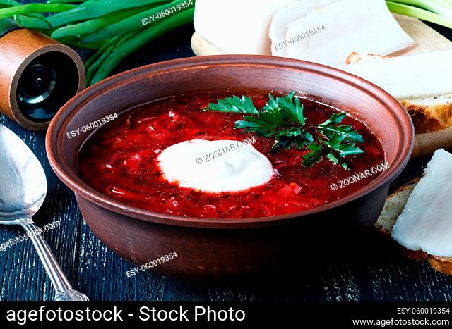 Traditional red soup borscht with meat
