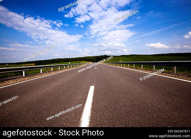 the road asphalted. summertime of year. Belarus