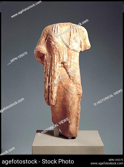 Marble statue of a kore (maiden). Period: Archaic; Date: late 6th century B.C; Culture: Greek; Medium: Marble, Island; Dimensions: H. 41 1/2 in. (105