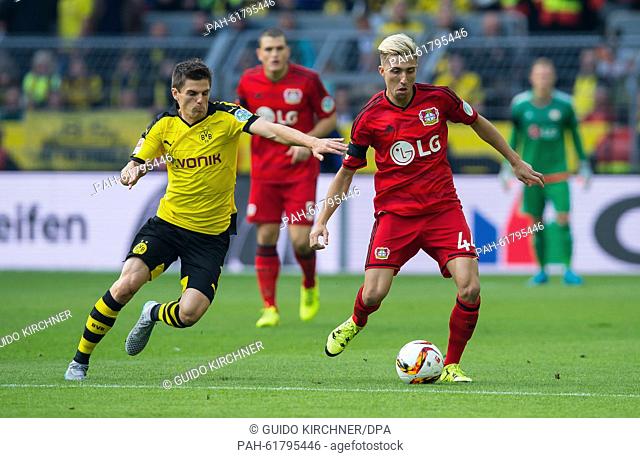 Dortmund's Jonas Hofmann (L) and Leverkusen's Kevin Kampl vie for the ball during the German Bundesliga soccer match between Borussia Dortmund and Bayer...
