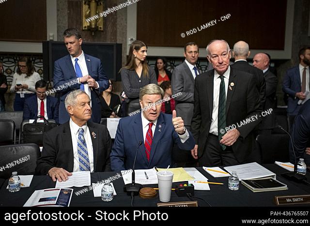 United States House Committee on Armed Services Chairman Mike Rogers (Republican of Alabama), center, gives a thumbs-up to United States Senator Jack Reed...