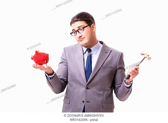 Businessman breaking piggybank isolated white background
