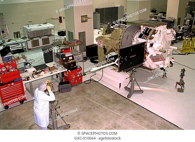 07/24/1997 --- An Applied Physics Laboratory engineer from Johns Hopkins University tests for true perpendicular solar array deployment of the Advanced...