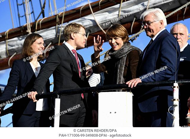 German President Frank-Walter Steinmeier (R)Â and his wife, Elke Budenbender (2nd from right), standing on board the sailboat Thor Heyerdahl next to the Premier...