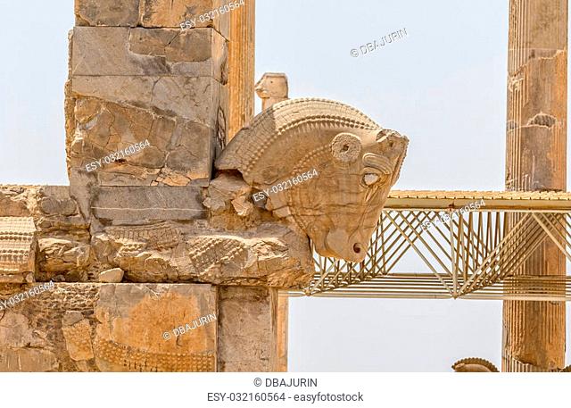 Taurus head part of the old wall of the ruins of old city Persepolis