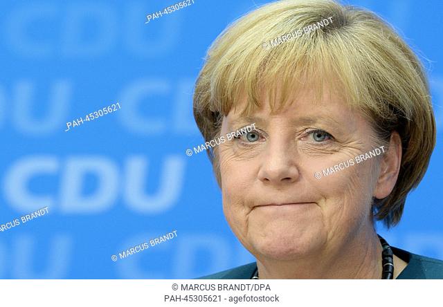 (FILE) The file photo dated 23 September 2013 shows German Chancellor and CDU chairwoman Angela Merkel (CDU) at the press conference of the CDU after the...