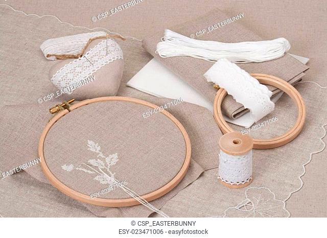 Sewing And Embroidery Craft Kit. Natural Linen Background