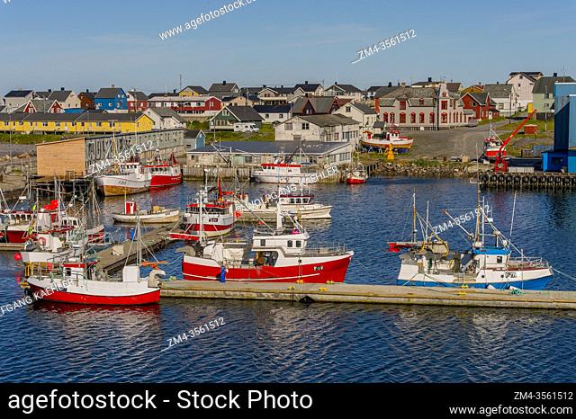 View of fishing boats in the harbor of Vardo, a town on an island in the Barents Sea in northern Norway, Finnmark
