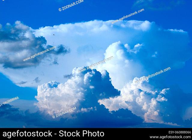 Beautiful white clouds on blue sky background. White clouds on boundless sky. Blue sky with white clouds. Landscape and blue sky. Heaven view