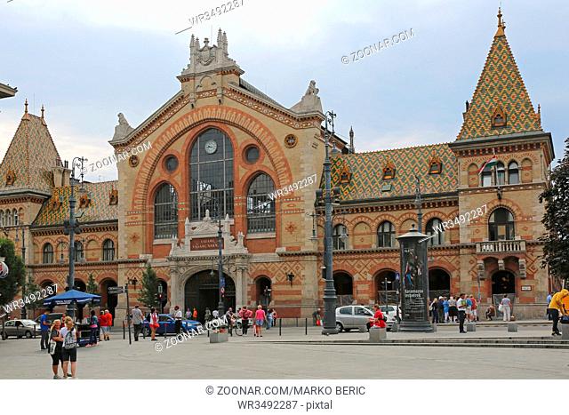 BUDAPEST, HUNGARY - JULY 13, 2015: Central Market Hall at Fovam Square With People and Traffic in Budapest, Hungary