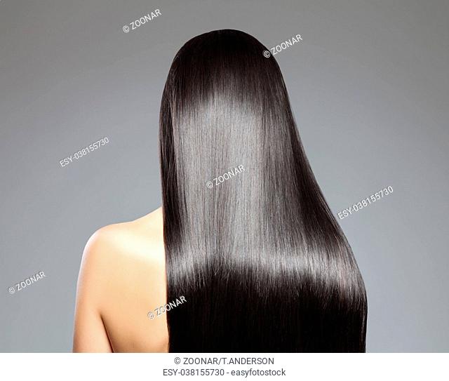 Back view of a woman with long straight hair