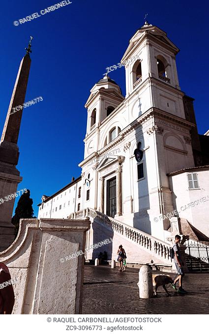 The church of the Santissima TrinitÃ  dei Monti, often called merely the TrinitÃ  dei Monti, above the Spanish Steps which lead down to the Piazza di Spagna
