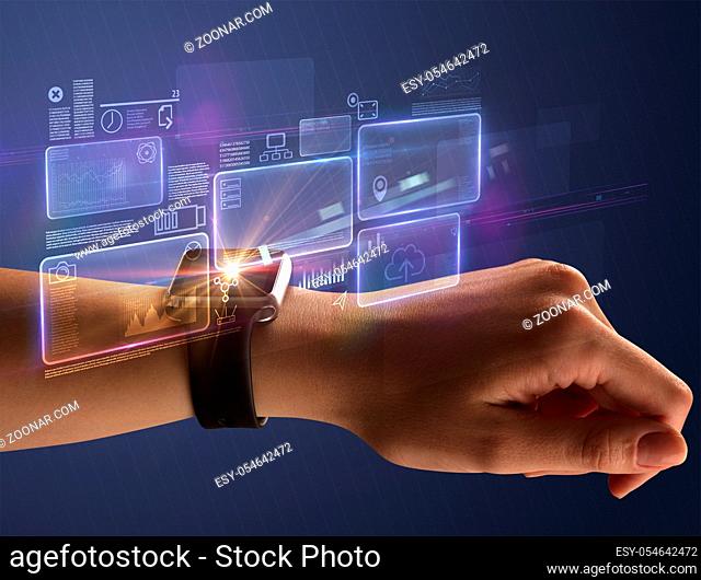 Female hand wearing smartwatch with statement labels around and dark background