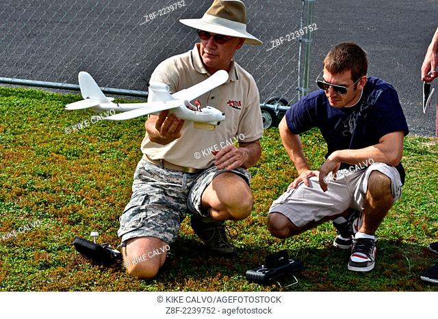 Students learn to fly fixed-wing RC planes at a small unmanned aircraft pilot training course at the Unmanned Vehicle University