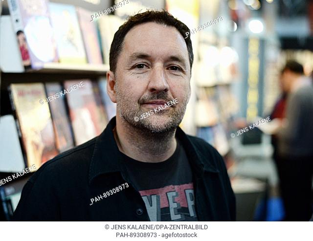 The Canadian comic artist Guy Delisle is photographed during the Leipzig Book Fair in Leipzig, Germany, 24 March 2017. Photo: Jens Kalaene/dpa-Zentralbild/ZB |...