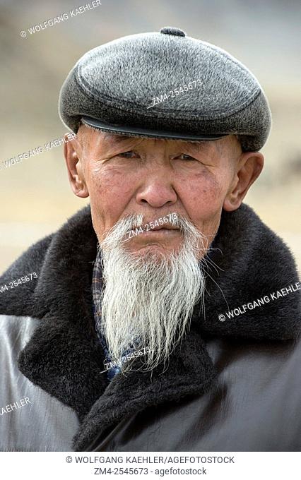 Portrait of a man with beard at the Golden Eagle Festival on the festival grounds near the city of Ulgii (Ölgii) in the Bayan-Ulgii Province in western Mongolia