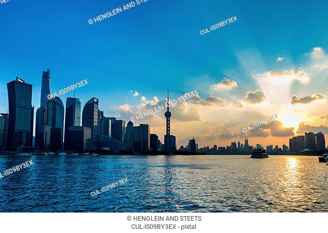 Pudong skyline and Huangpu river at sunset, Shanghai, China