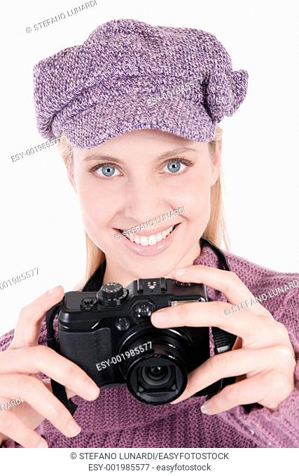 Beautiful young woman with camera, isolated on white