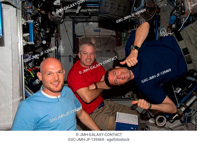 NASA astronaut Steve Swanson (center), Expedition 40 commander; along with European Space Agency astronaut Alexander Gerst (left) and NASA astronaut Reid...