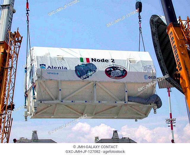 The International Space Station U.S. Node 2 module is hoisted into an Airbus Beluga heavy-lift aircraft. The aircraft departed May 30 from Turin