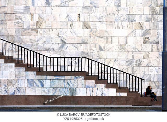Arengario stairs with woman (waiting for elevetor) - Milan, Italy