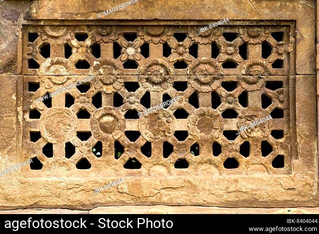 Carved stone windows in Ladkhan temple in Aihole, Karnataka, South India, India, Asia