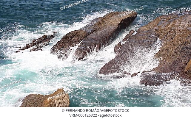 Waves bathing the rocks