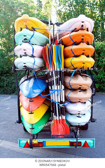 Trailer with kayaks and paddles