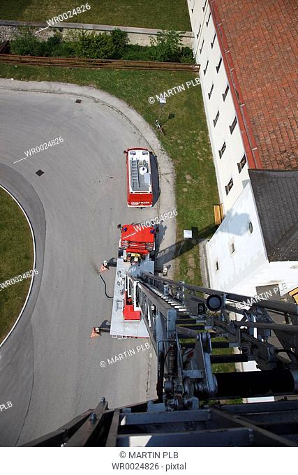 on the turntable ladder of the fire brigade