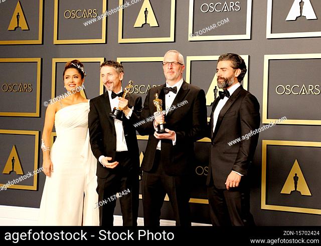 Mark Taylor, Stuart Wilson, Salma Hayek and Oscar Isaac at the 92nd Academy Awards - Press Room held at the Dolby Theatre in Hollywood, USA on February 9, 2020