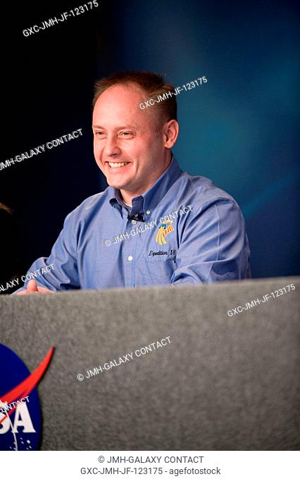 Astronaut Michael Fincke, Expedition 18 commander, responds to a question from a reporter during an Expedition 18Soyuz 17 pre-flight press conference at NASA's...