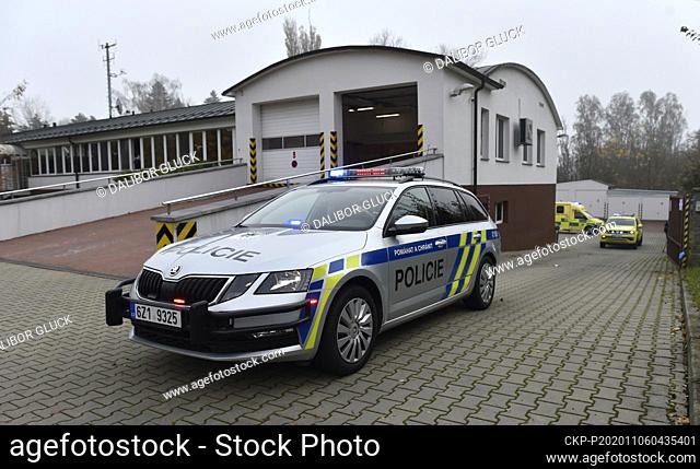 A convoy of ambulances, with five patients infected with coronavirus, accompanied by police officers leaves Kromeriz, Czech Republic, on November 6, 2020