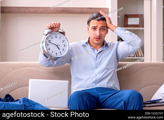 Male employee working from the house