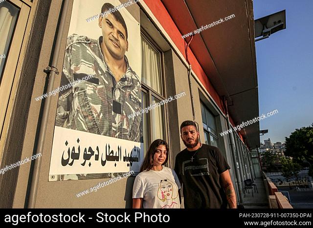 25 July 2023, Lebanon, Beirut: A picture provided on 28 July 2023 shows William Noun (R), brother of firefighter Joe, who was killed in the 4 August 2020...