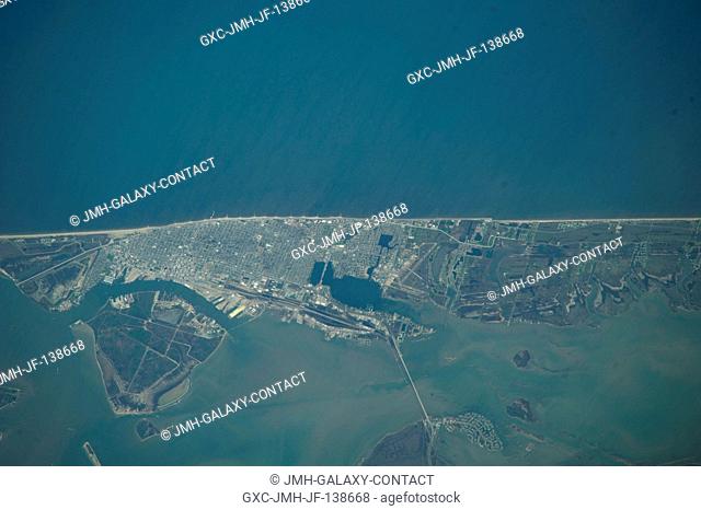 This nadir picture of Galveston Island and its coastline on the Gulf of Mexico was taken by one of the Expedition 39 crew members aboard the International Space...