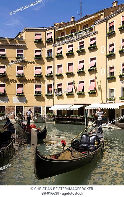 Gondolas in a canal, Hotel Cavalletto in the back, St Marks, Venice, Veneto, Italy, Europe