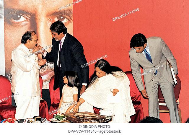 South Asian Indian Bollywood actor Amitabh Bachchan with wife Jaya ; son Abhishek Bachchan ; grand daughter Navya Naveli and Samajwadi party leader Amar Singh...